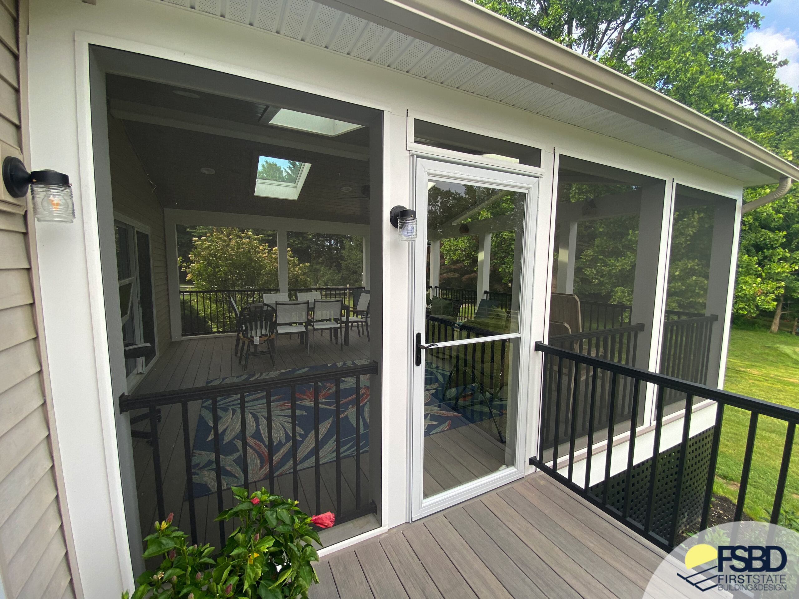 Covered porch with large screen windows