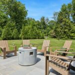 Patio with chairs and fire pit