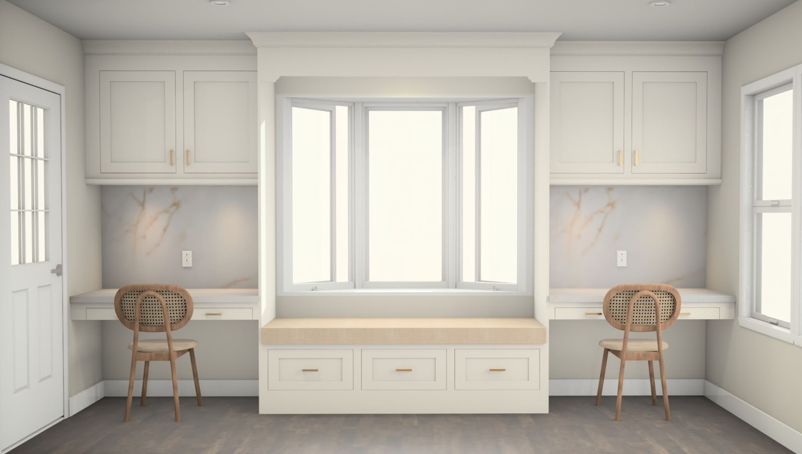 A bright home office features two built-in desks with rattan chairs on either side of a window seat with drawers below a large bay window, all in light-colored cabinetry.