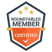 Verified-Roundtables-Member-Badge | First State Building & Design Certification badge reading 'ROUNDTABLES MEMBER' with an orange ribbon 'CERTIFIED' across a dark-outlined shield and three orange stars above.